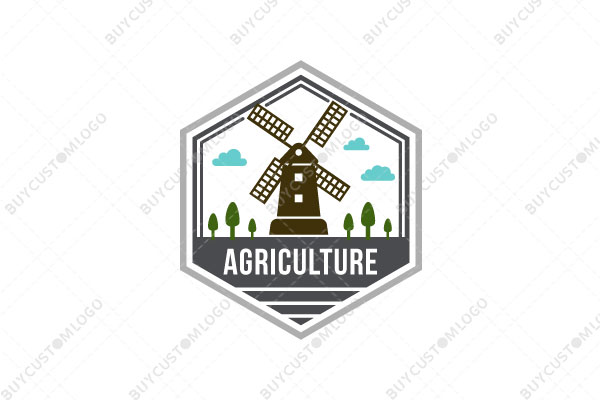 windmill building and clouds in a hexagon seal logo