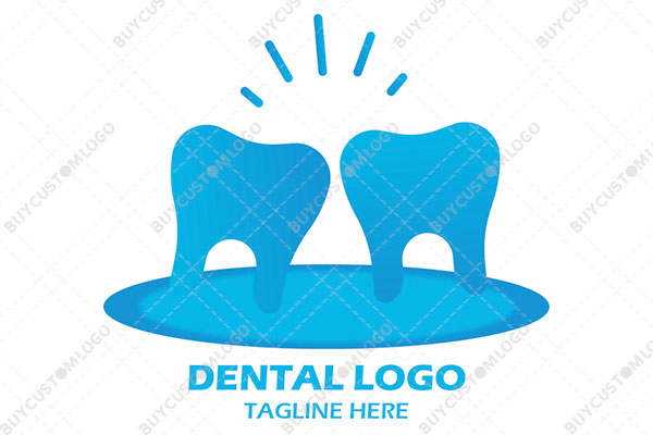 shiny blue tooths on a ground logo