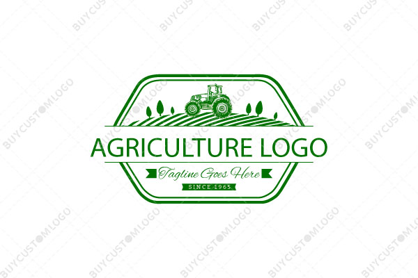 tractor, trees and field in an elongated hexagon logo