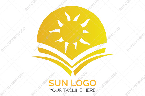 open book golden sun logo