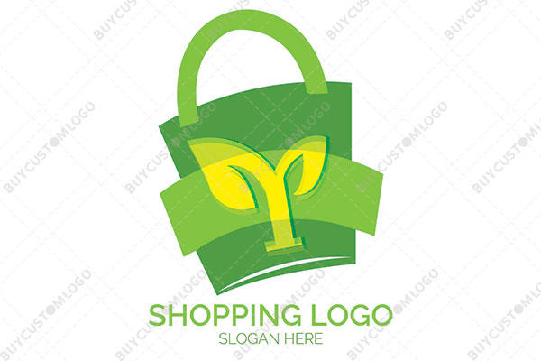 letters y and m stem in a shopping bag logo