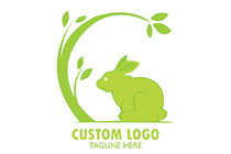 tree branch with leaves and a bunny logo