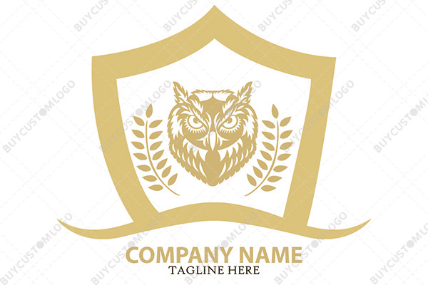 determined feathery owl heraldic style logo