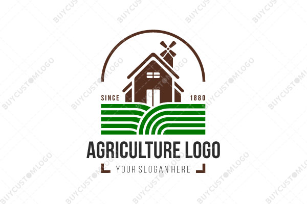 house with a wind turbine on fields logo